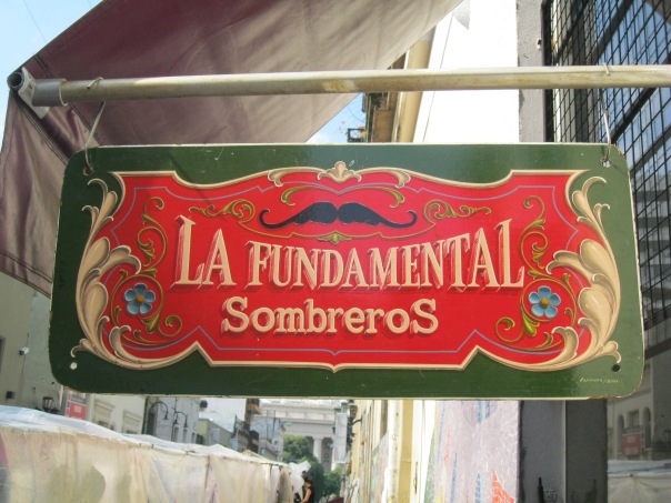 This is a very classic sign - with traditional paints, colors, and decoratif elements.